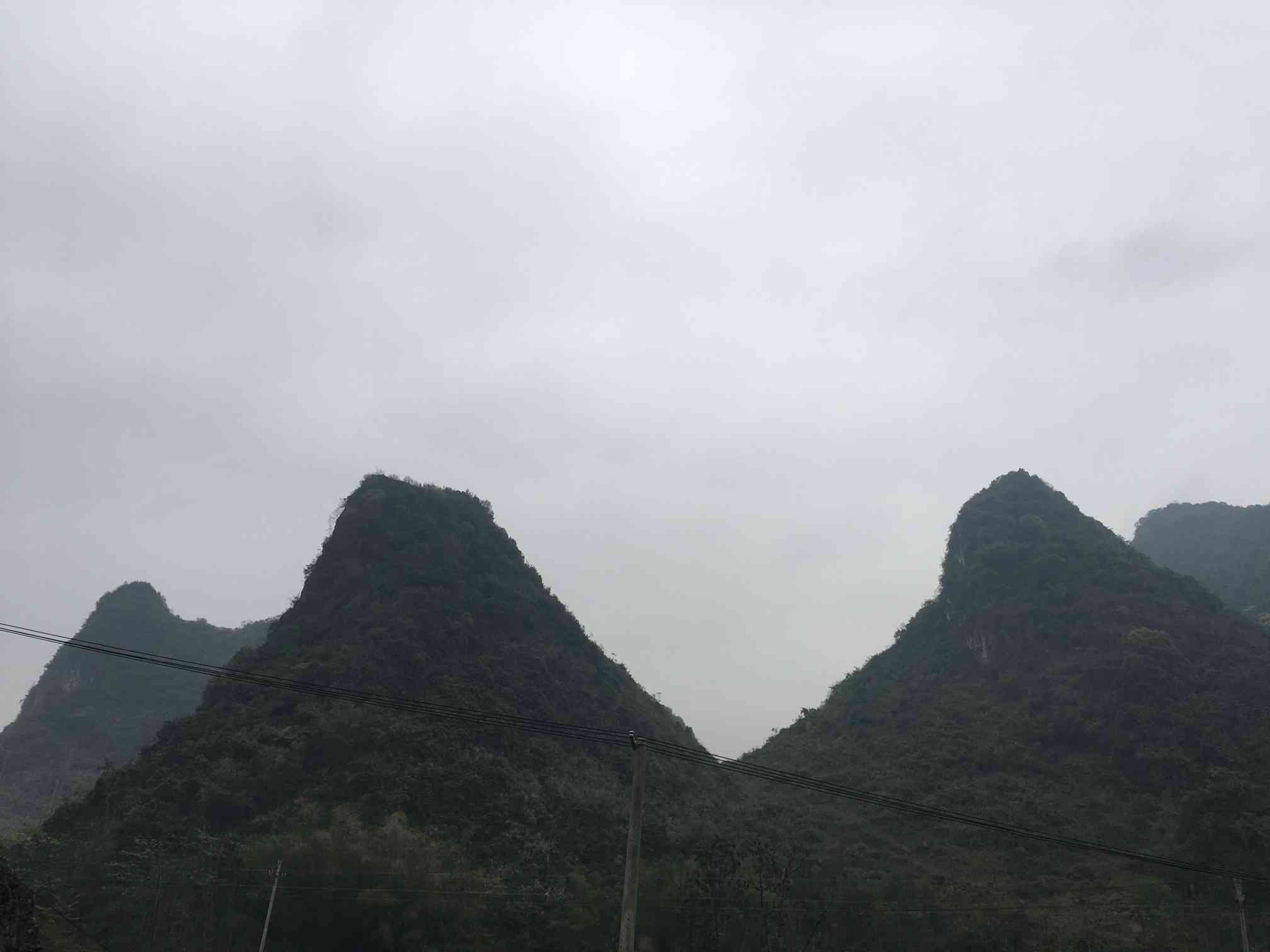 弄友山